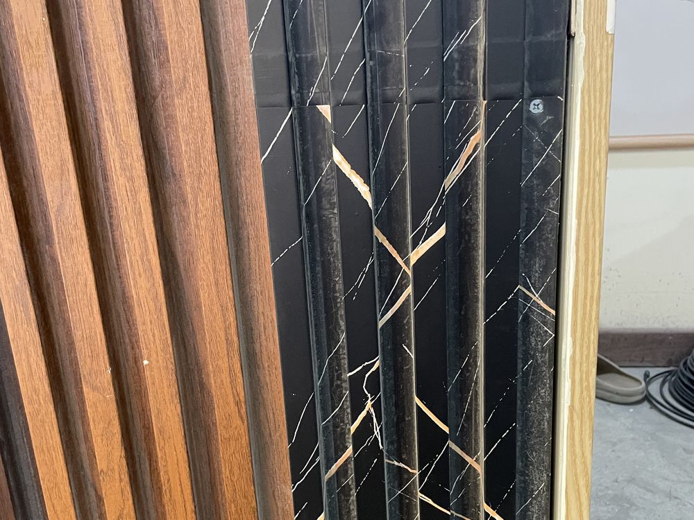 Dark marble-pattern fluted wall cladding